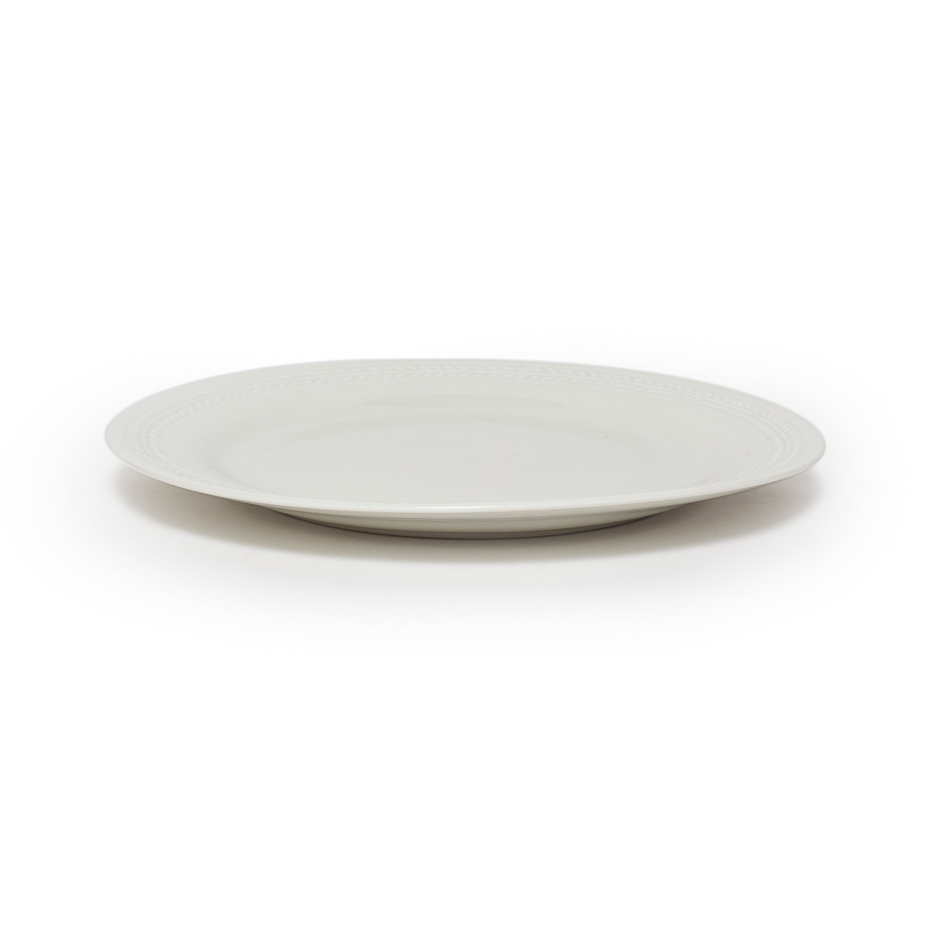White ceramic plate on a white background