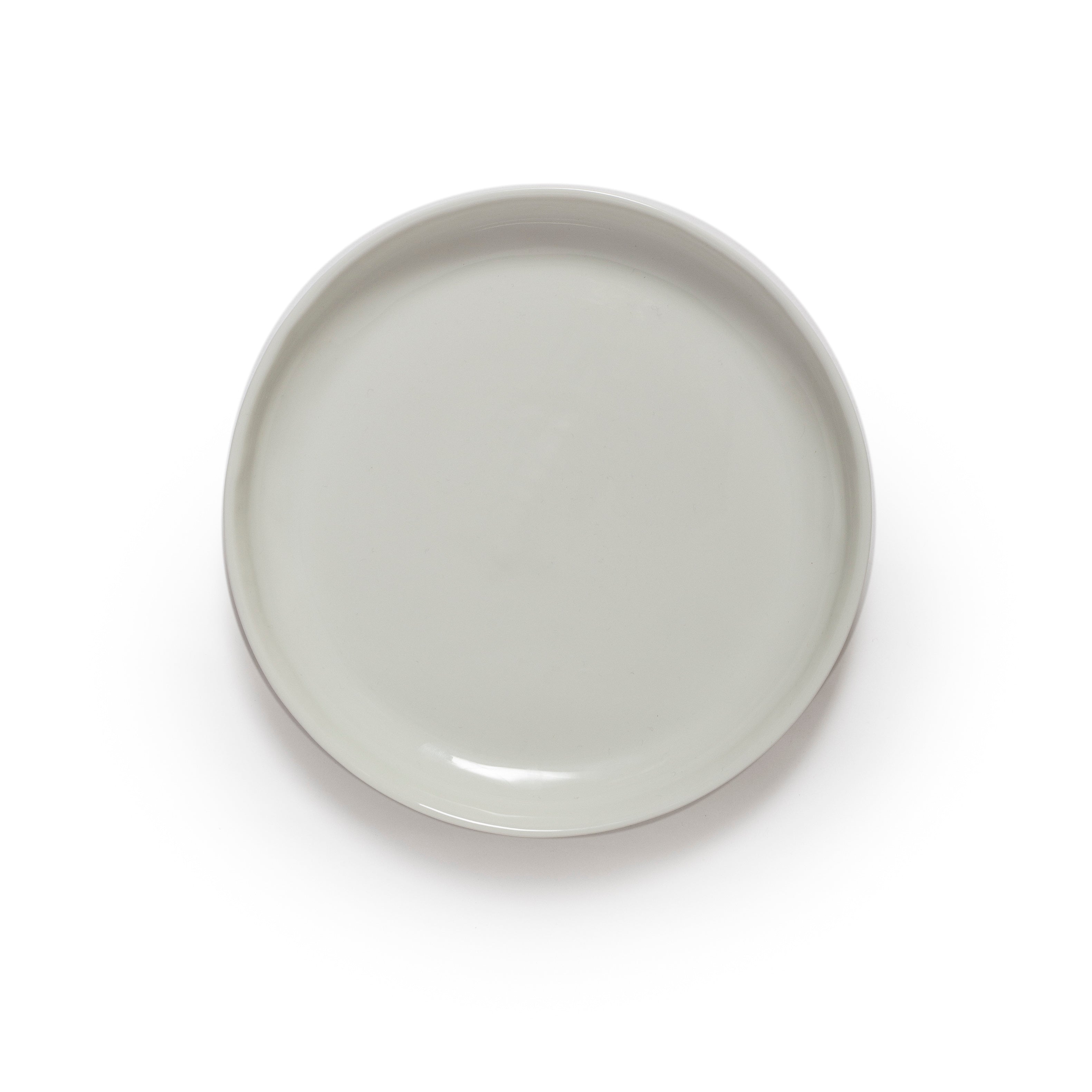Round ceramic plate on a white background