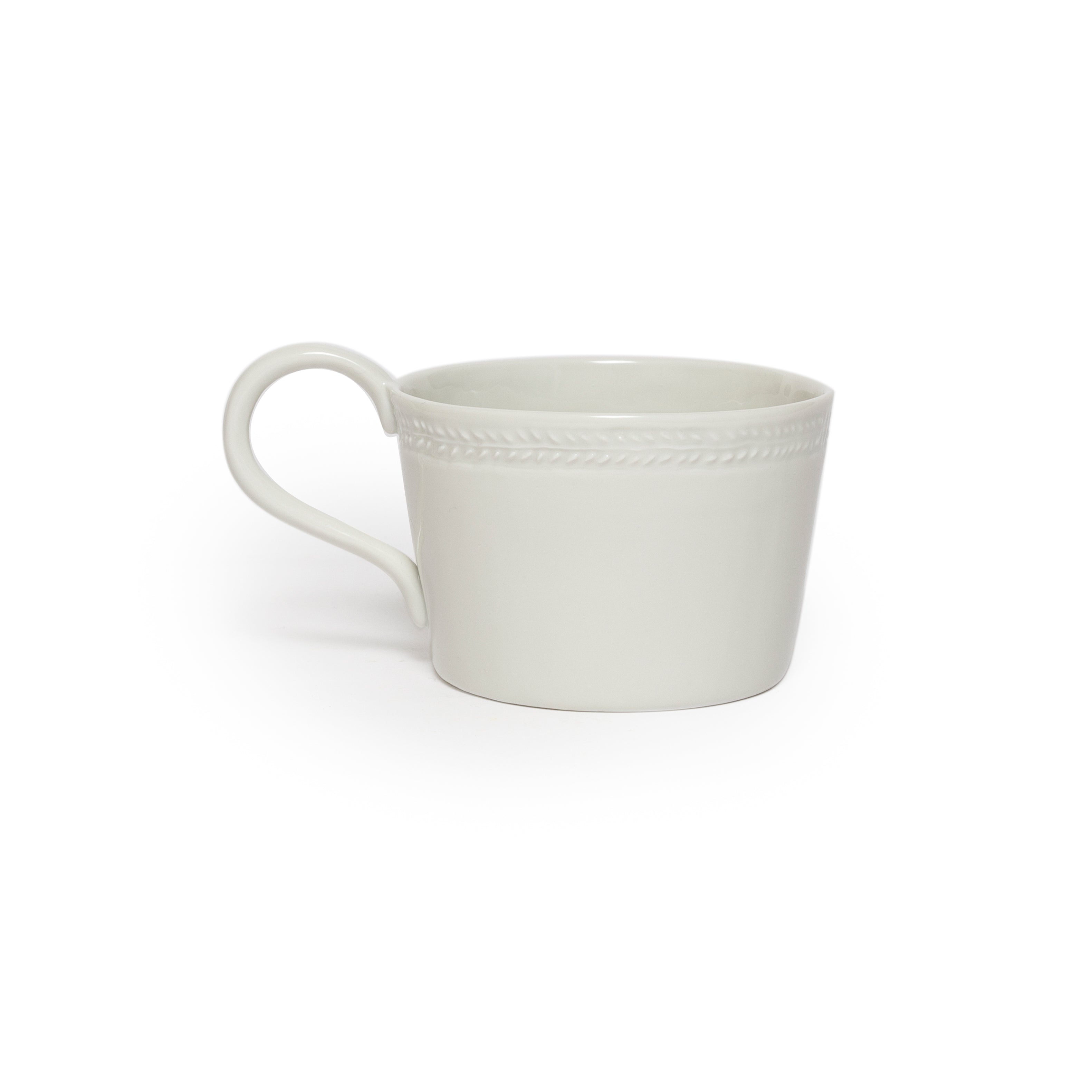 White ceramic mug on a white background