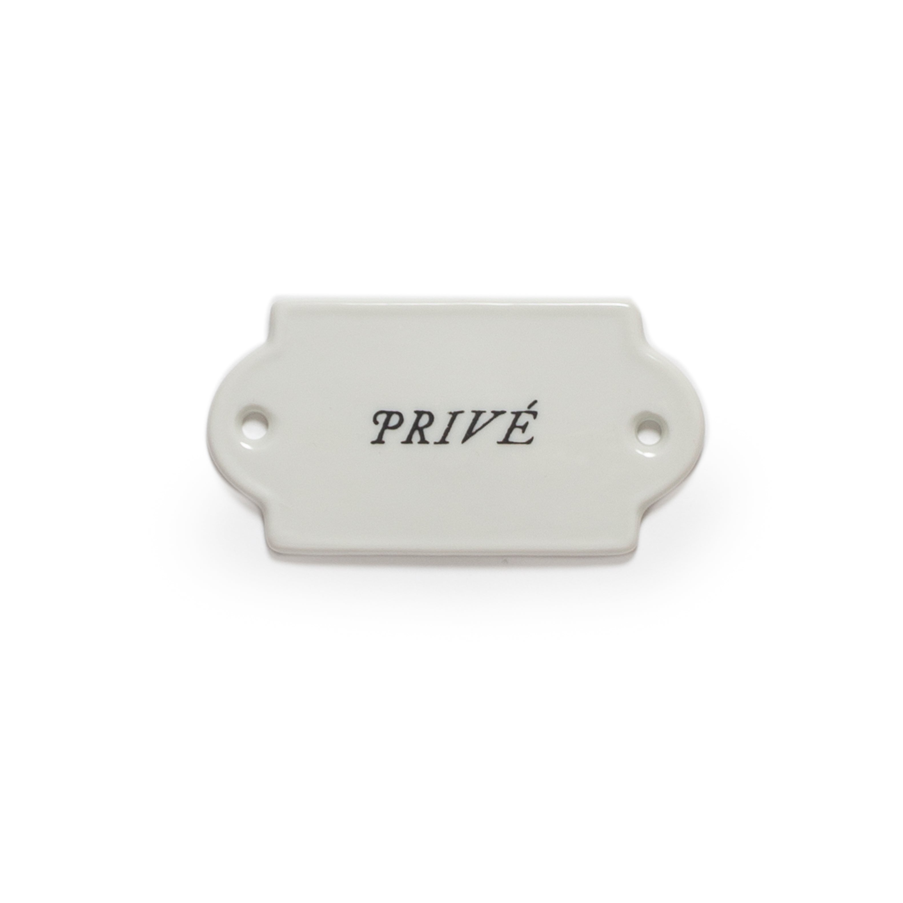 White rectangular plate with 'PRIVé' text on a white background