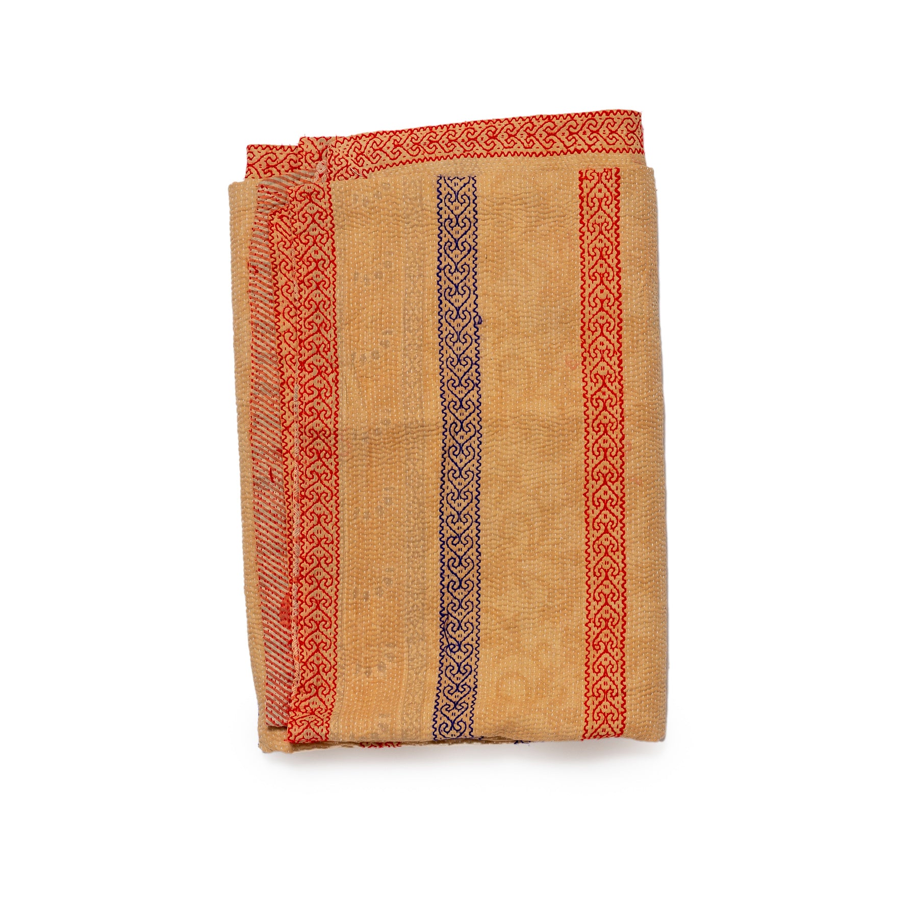 Folded fabric with red and blue patterns on a white background