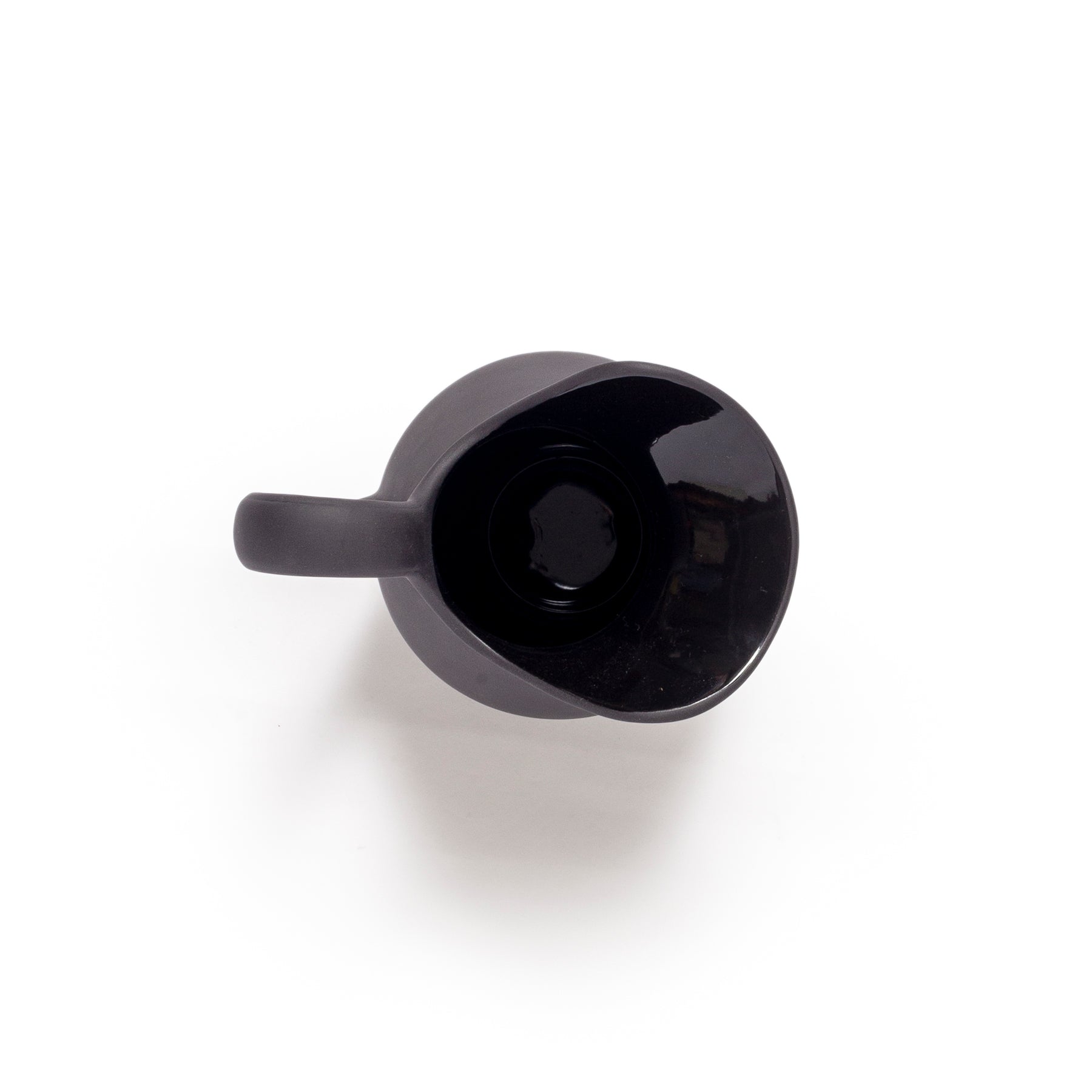 Black pitcher on a white background