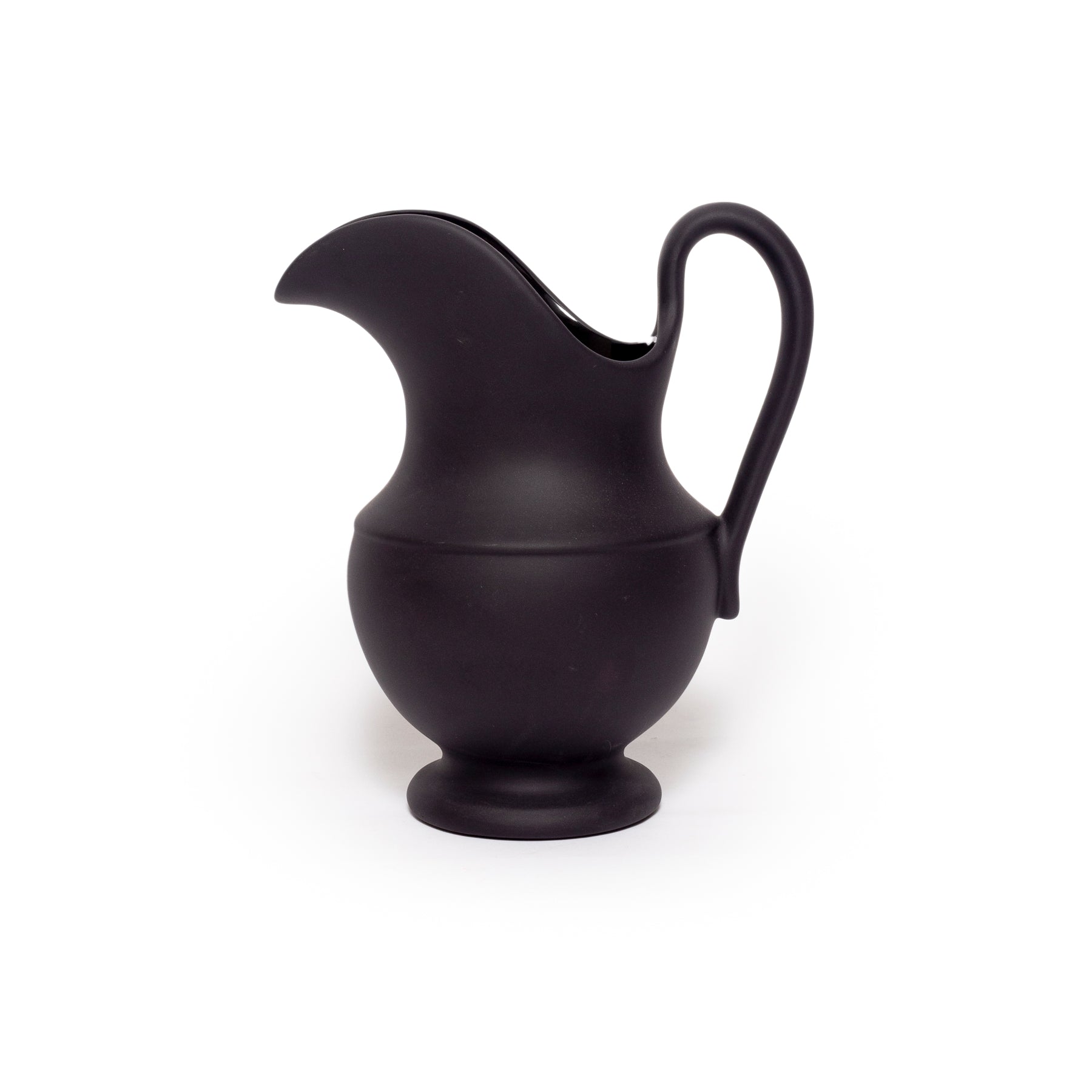 Black pitcher on a white background
