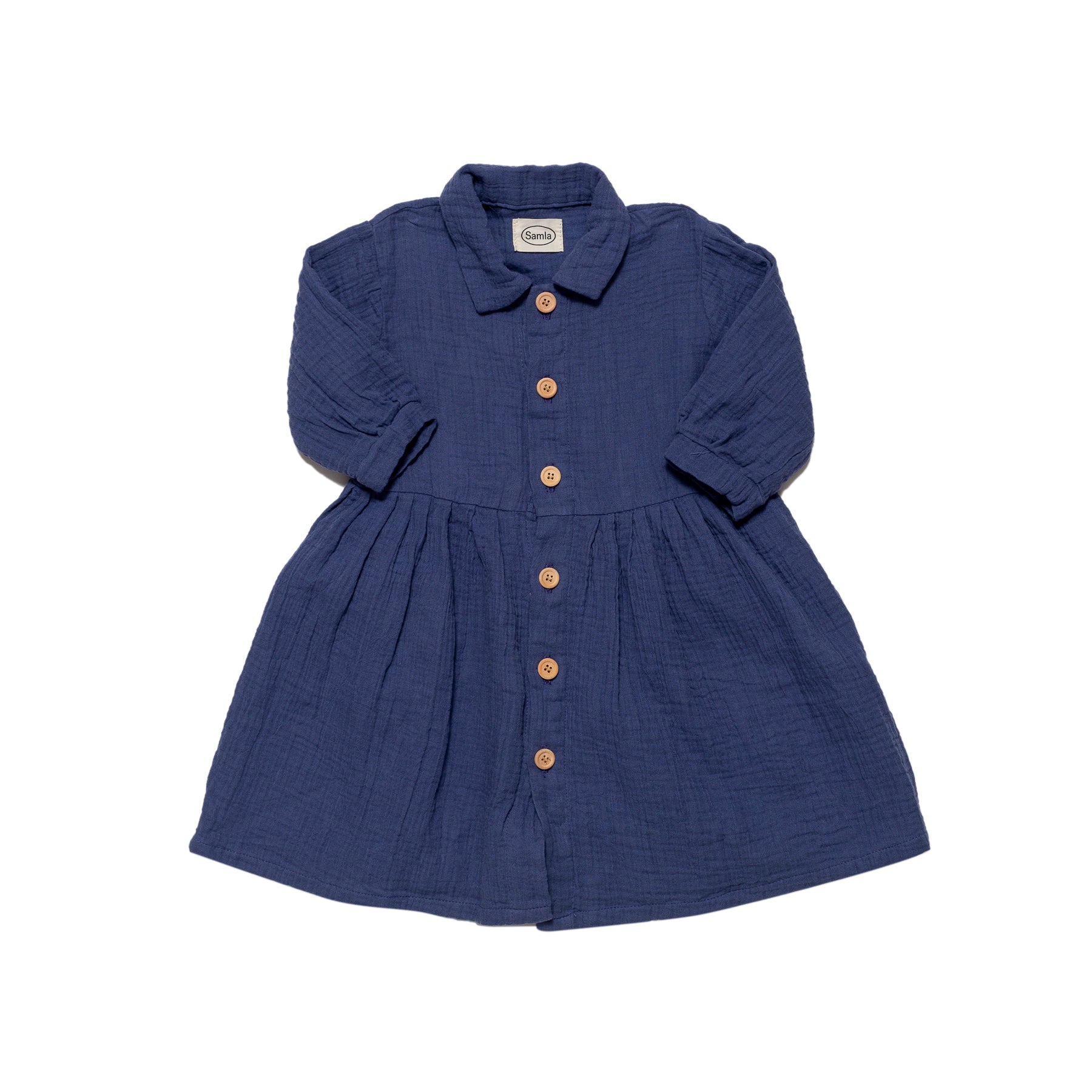 Blue dress with buttons on a white background