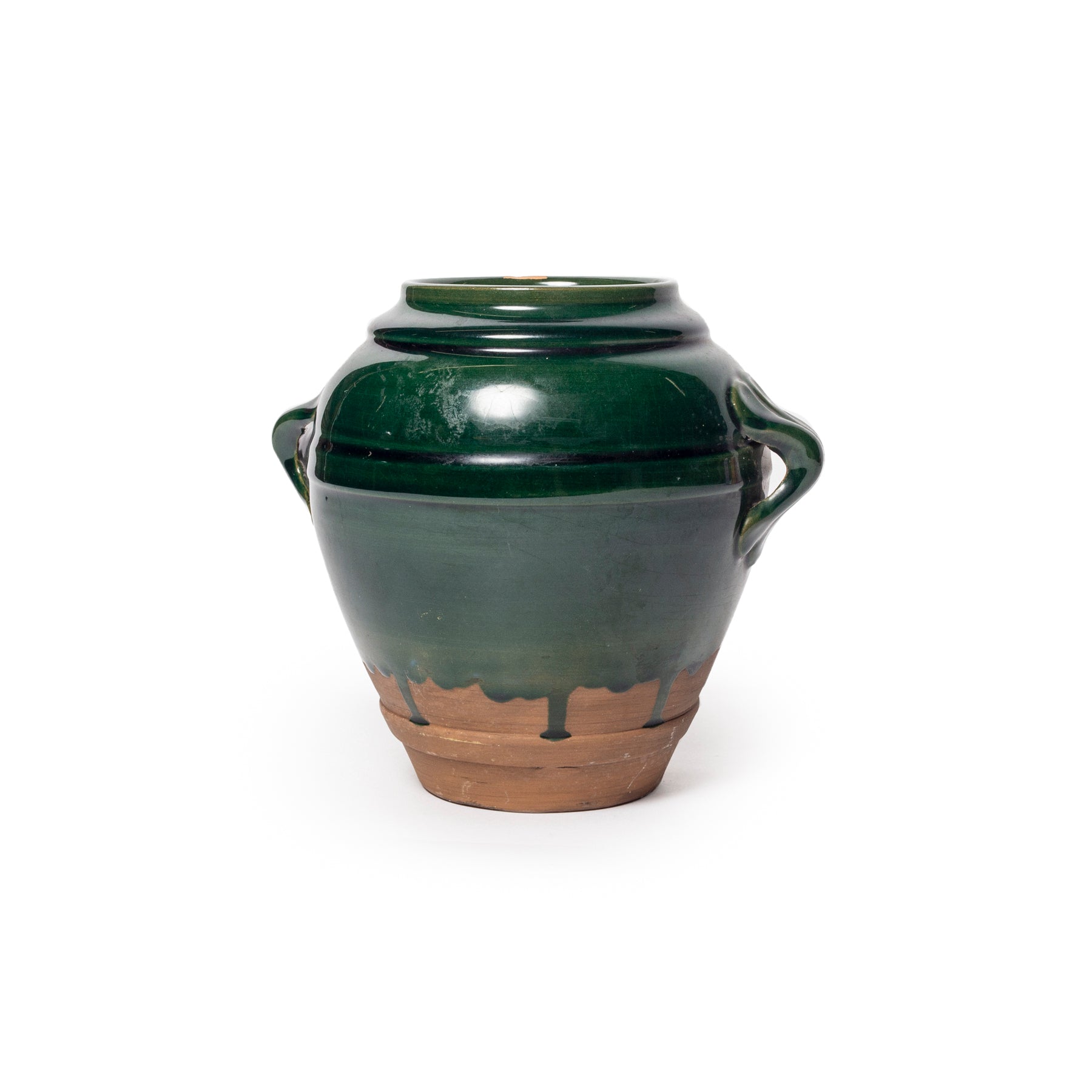 Green ceramic jar with handles on a white background