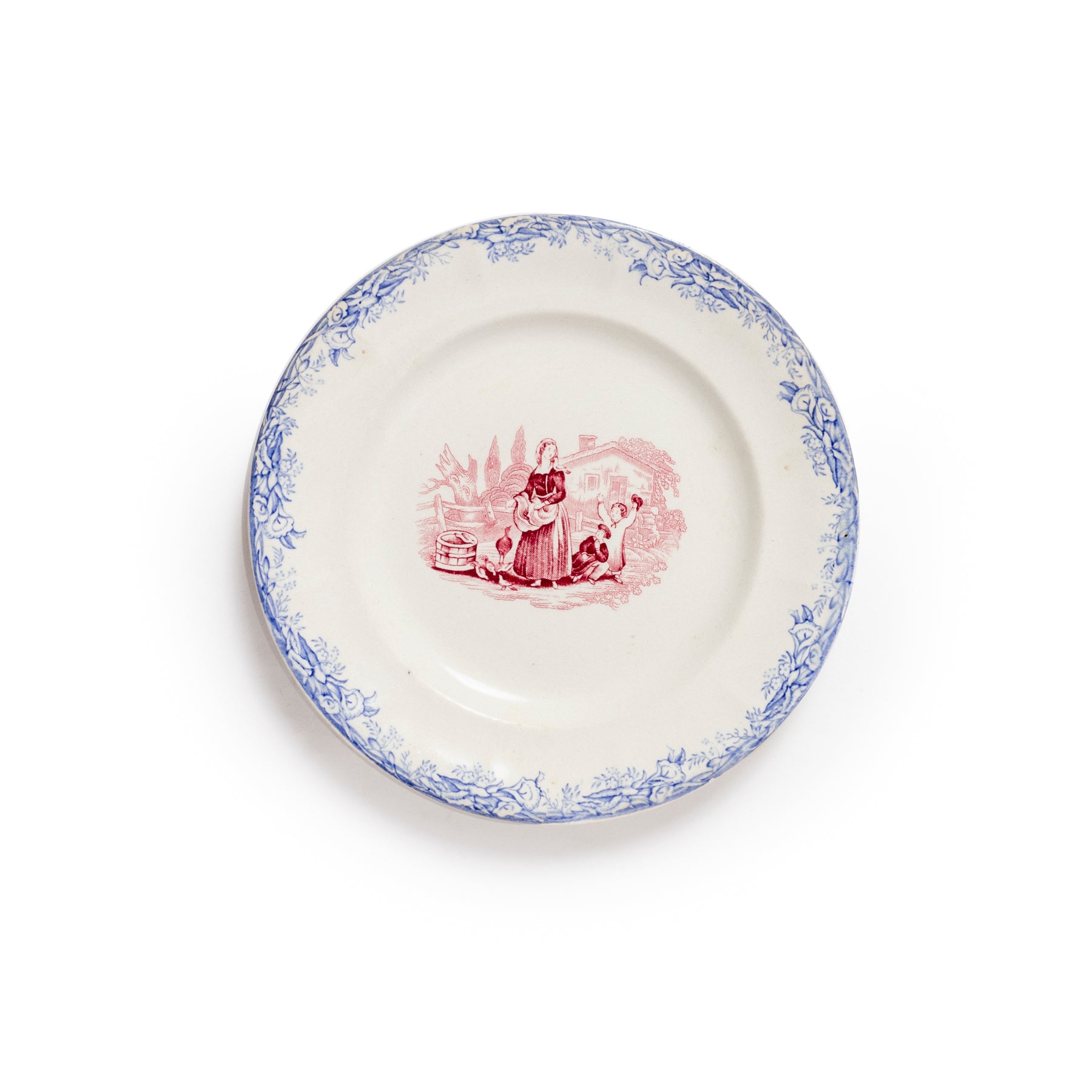 Decorative plate with a pink printed design on a white background