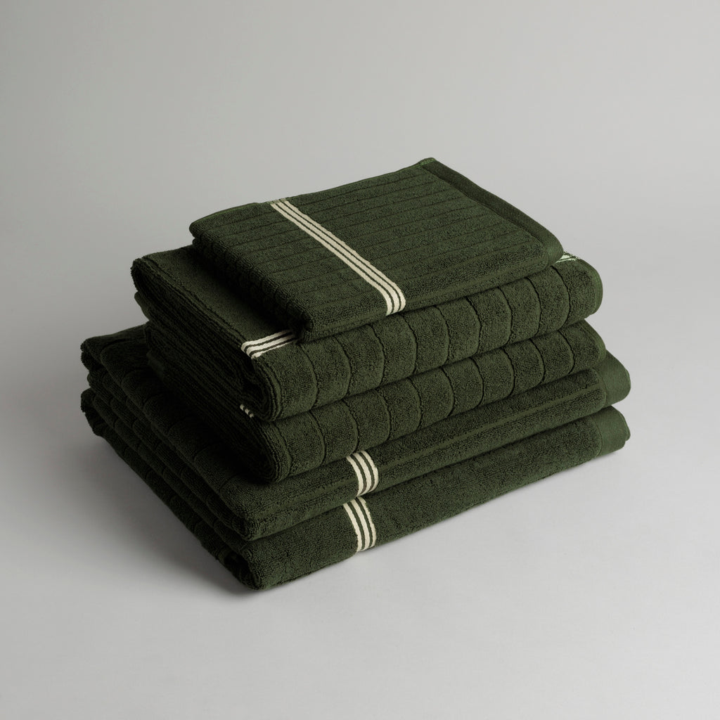 Stack of folded Baina Moss Towels