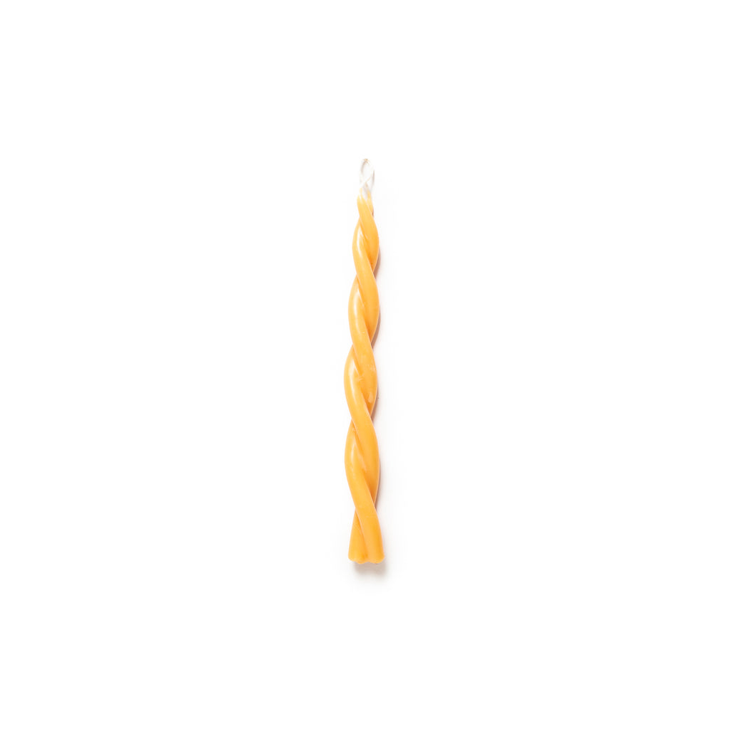 Light Orange Twisted Taper Candle.