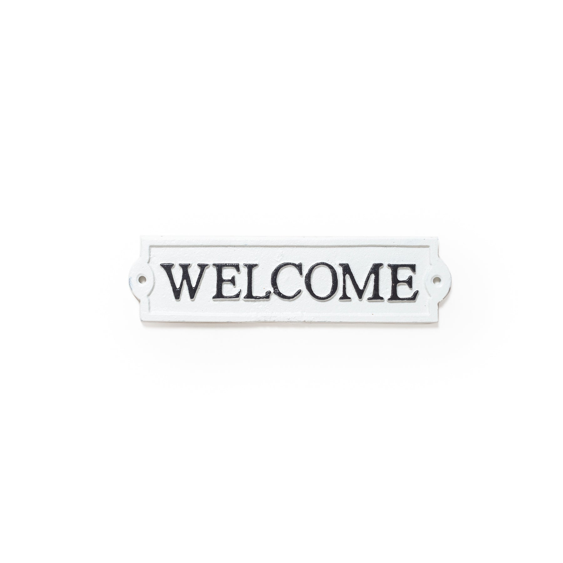 White and Black Cast Iron Welcome Sign